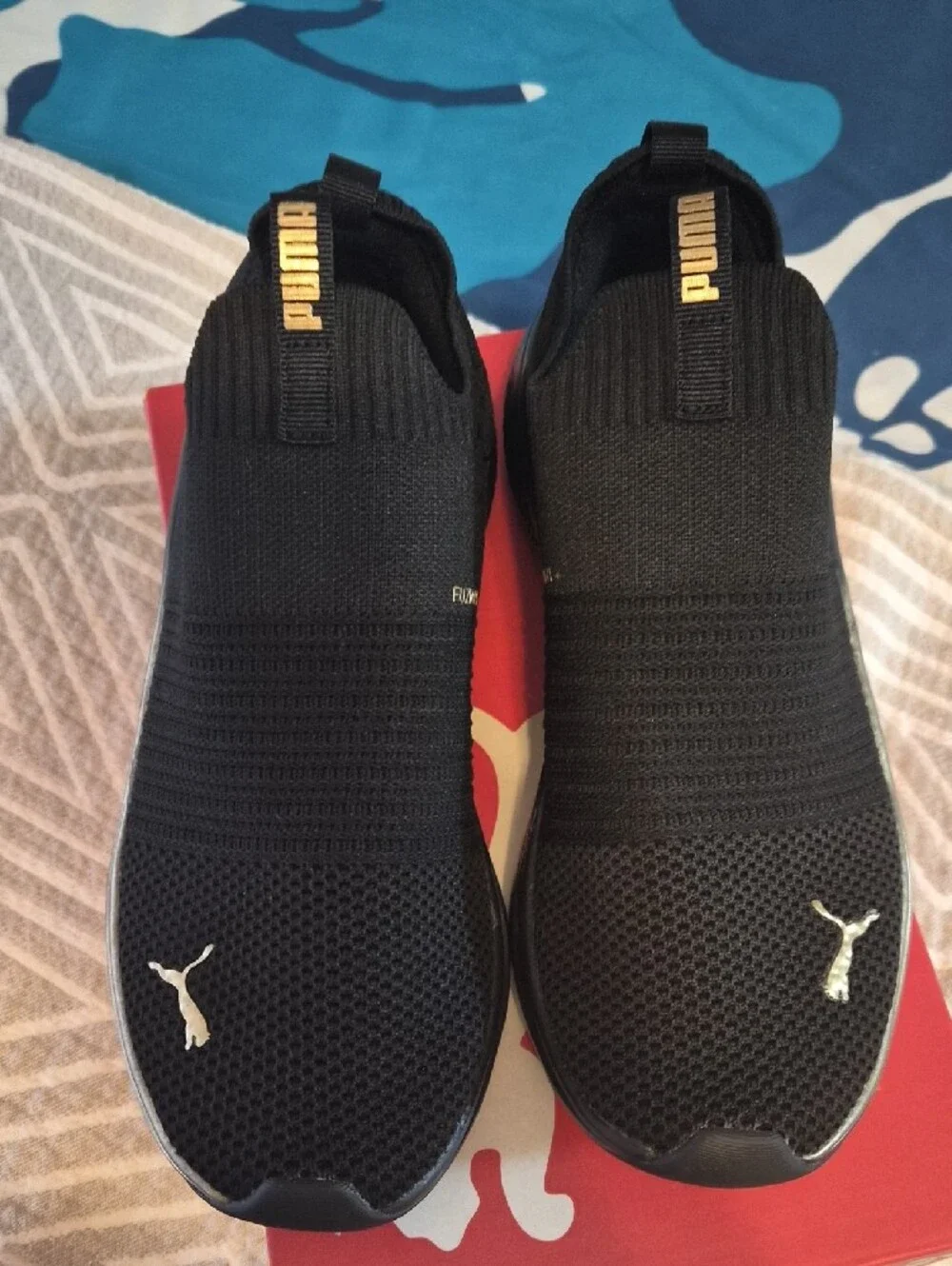 Puma Men’s Black Slip-On Knit Sneakers with Gold Trim